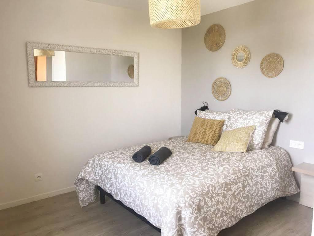 Giường trong phòng chung tại Appart'Hotel - Gare TGV - Courtine - Confluence - 202