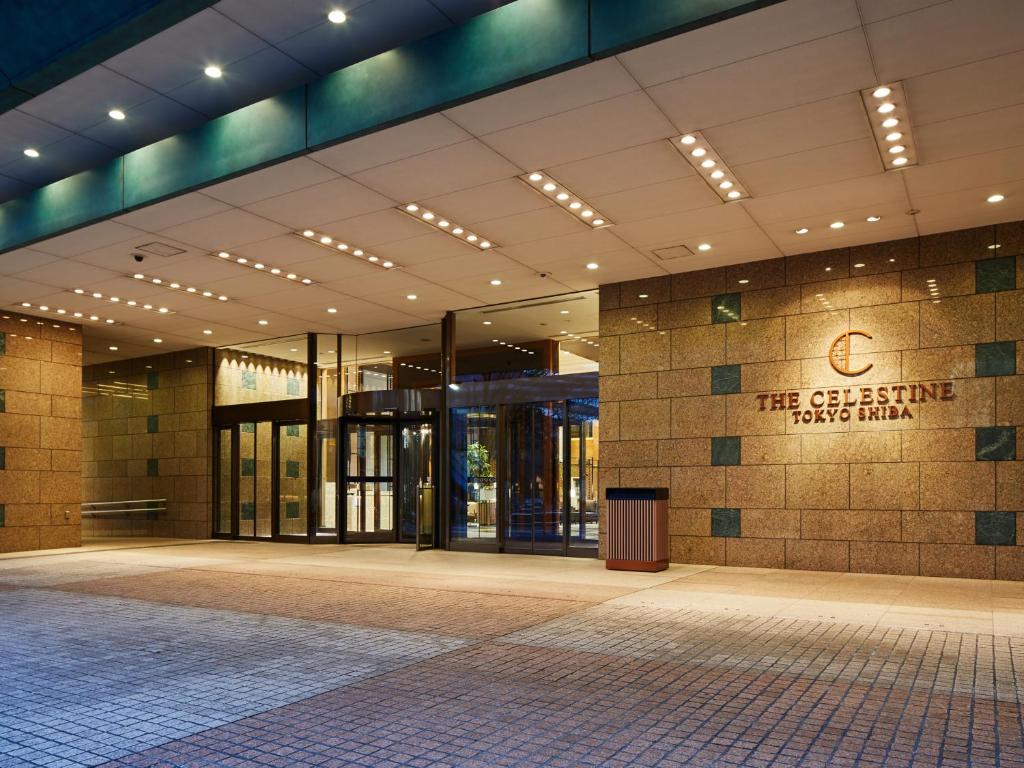 a building with a sign on the side of it at Hotel The Celestine Tokyo Shiba in Tokyo