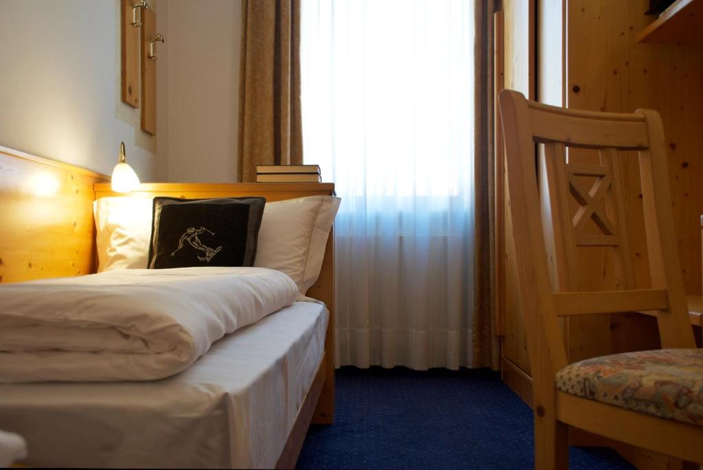 Postel nebo postele na pokoji v ubytování Hotel Belfiore