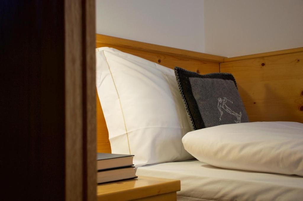 Postel nebo postele na pokoji v ubytování Hotel Belfiore