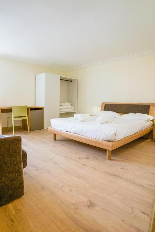 Postel nebo postele na pokoji v ubytování Italianflat - Verona Suite