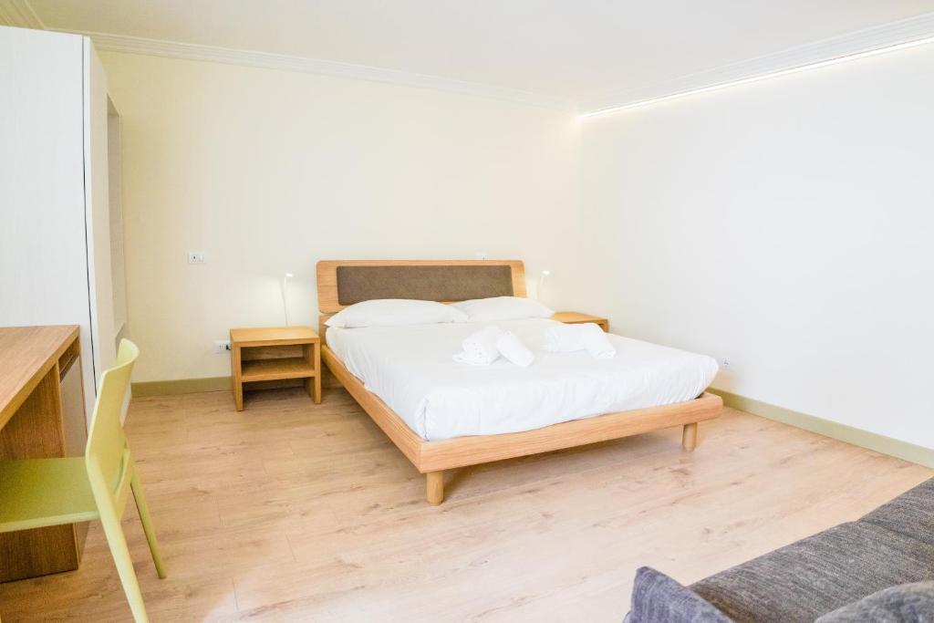 Postel nebo postele na pokoji v ubytování Italianflat - Verona Suite