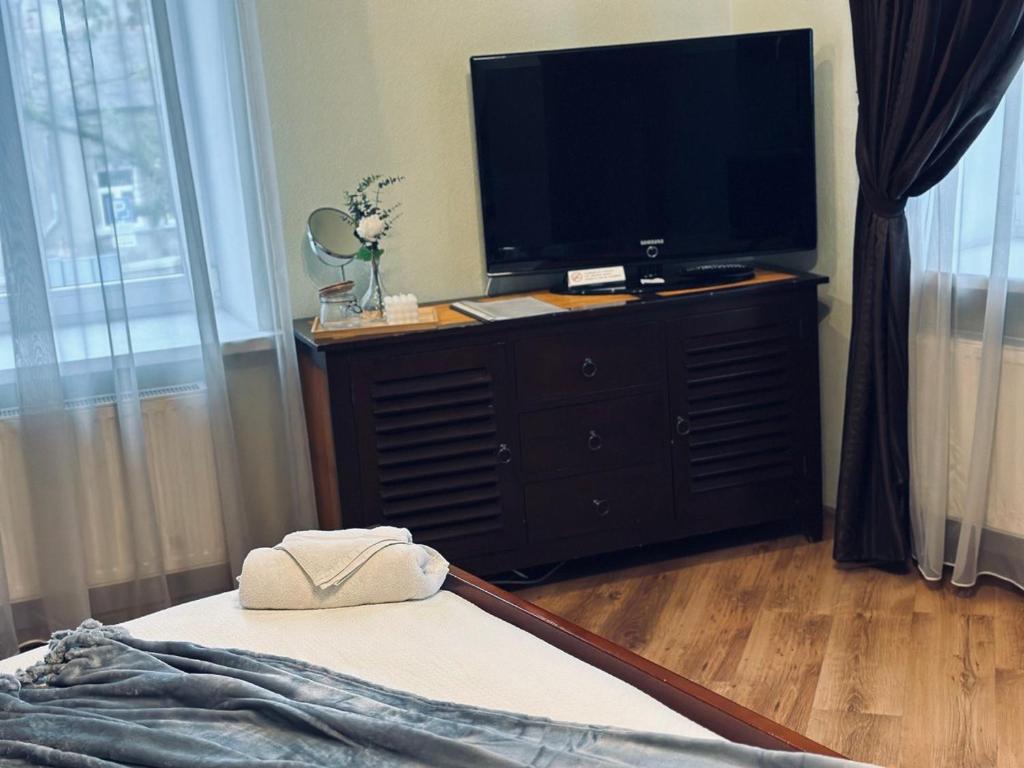 Postel nebo postele na pokoji v ubytování Apartamenti DVINSKA