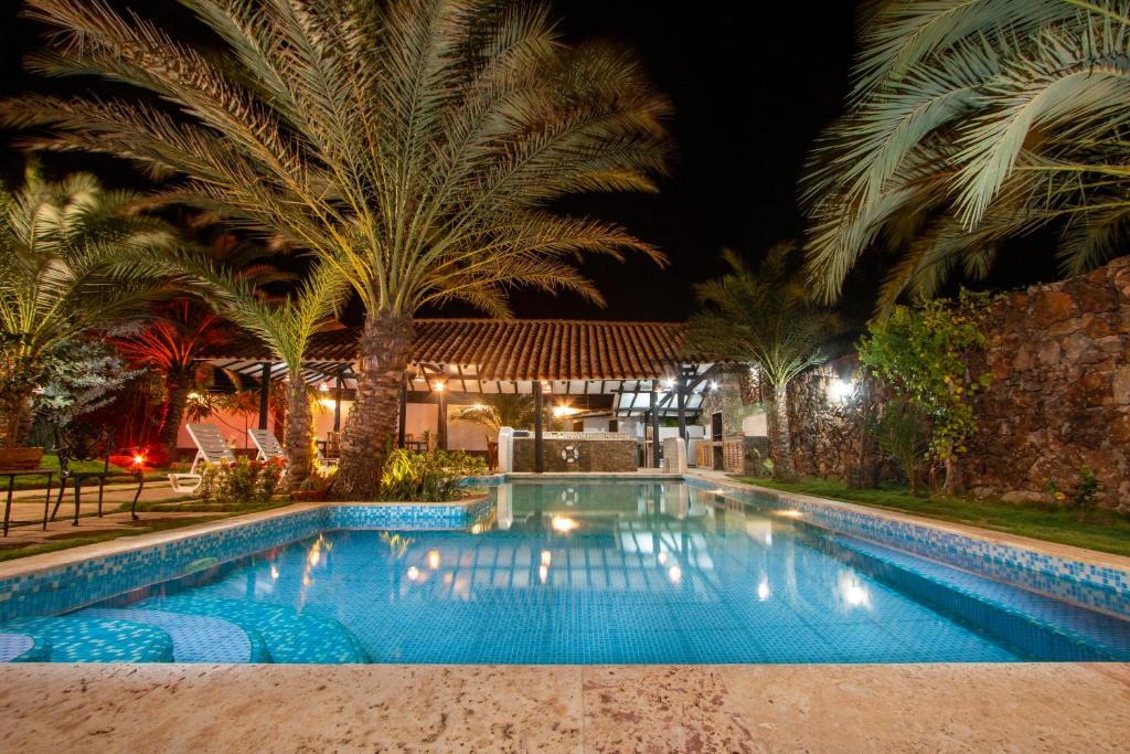 Bazén v ubytování Playa El YAQUE Posada Yaque Sol, Isla de Margarita nebo v jeho okolí
