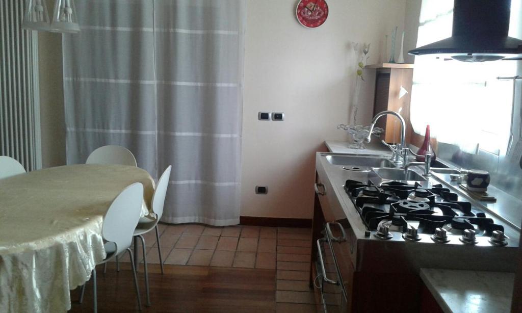 Kuchyň nebo kuchyňský kout v ubytování B & B Paradiso