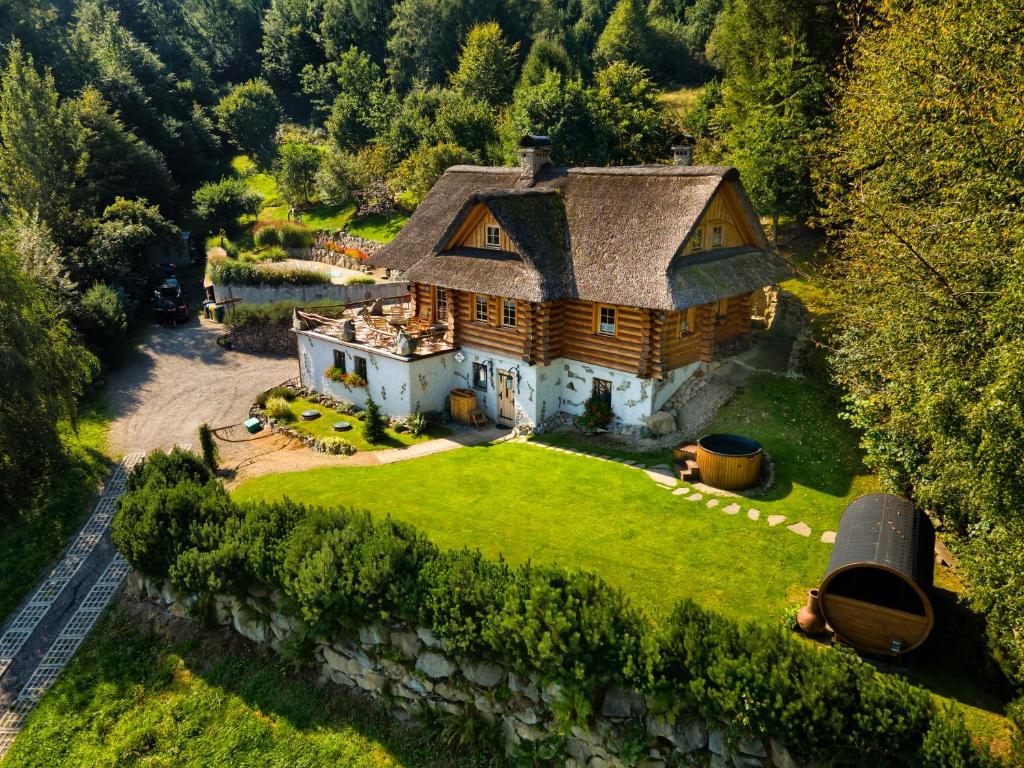 an aerial view of a large house on a lawn at Chata Góralska Exclusive SPA - Lipowa Beskidy in Lipowa