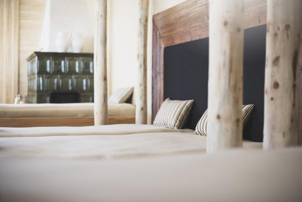 Postel nebo postele na pokoji v ubytování Hotel Hoferwirt