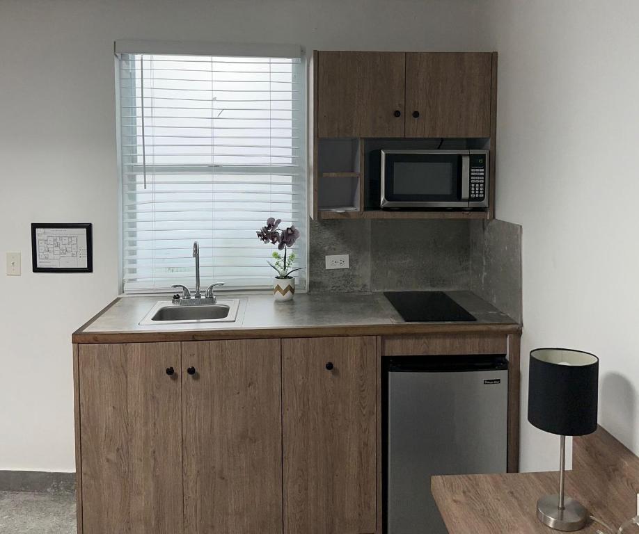 Kuchyň nebo kuchyňský kout v ubytování Casa Condado Hotel & Residences