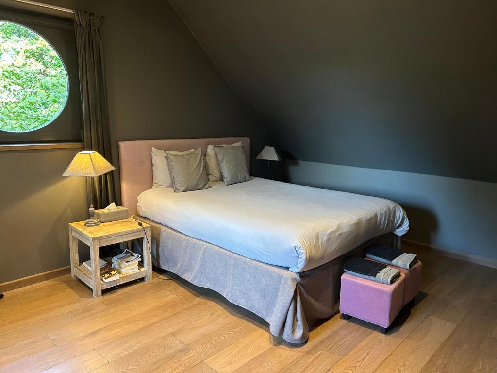 Postel nebo postele na pokoji v ubytování B&B Des Heures Claires