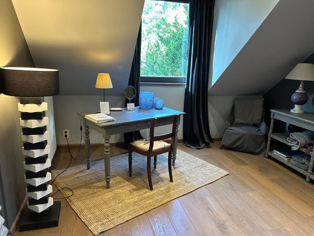 Posezení v ubytování B&B Des Heures Claires