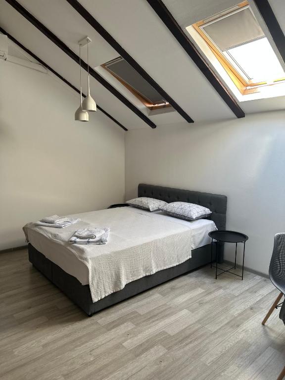 Postel nebo postele na pokoji v ubytování Apartments Ejla&Una