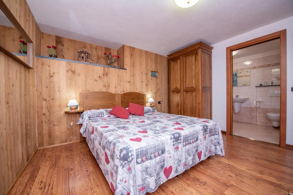 Postel nebo postele na pokoji v ubytování Agriturismo La Clochette