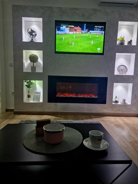 TV a/nebo společenská místnost v ubytování lux two