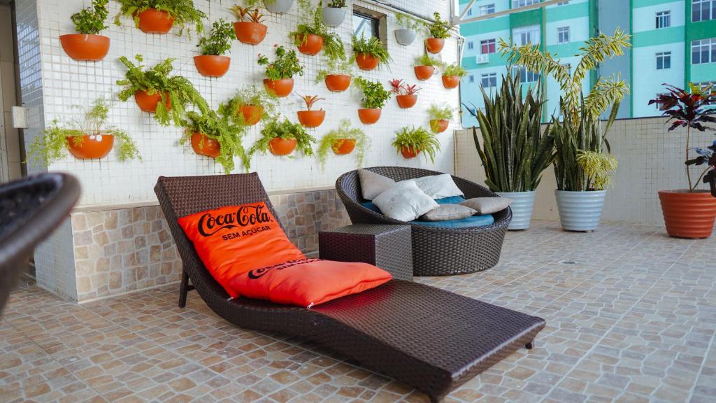 Uma área de estar em Atlântico Praia Hotel