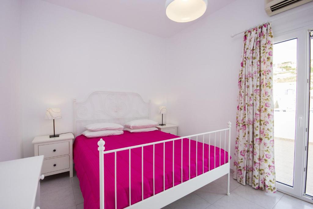 Postel nebo postele na pokoji v ubytování Anixi Hotel