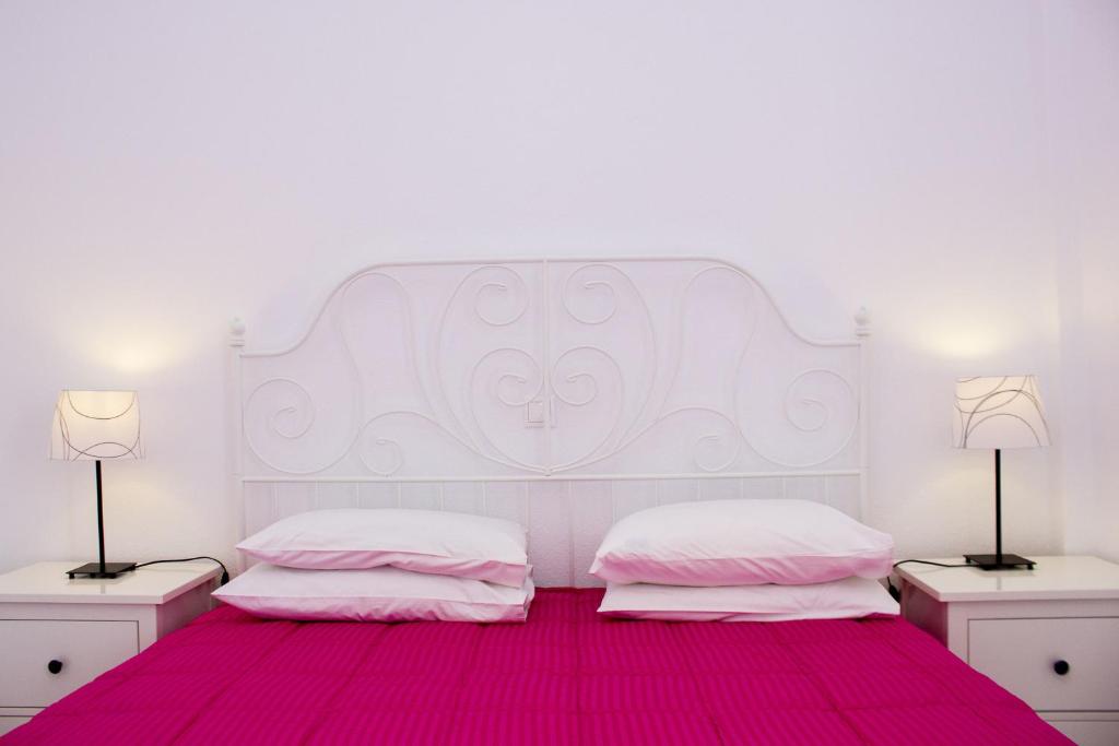 Postel nebo postele na pokoji v ubytování Anixi Hotel