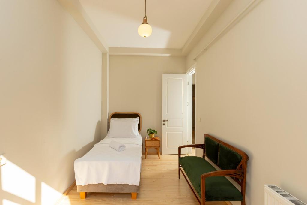 Postel nebo postele na pokoji v ubytování Lemon Apartments