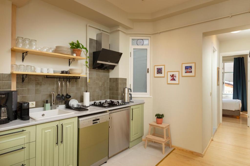 Kuchyň nebo kuchyňský kout v ubytování Lemon Apartments
