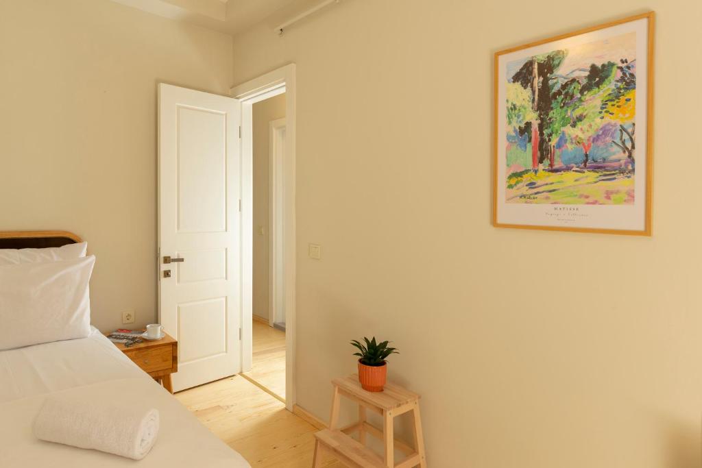 Postel nebo postele na pokoji v ubytování Lemon Apartments