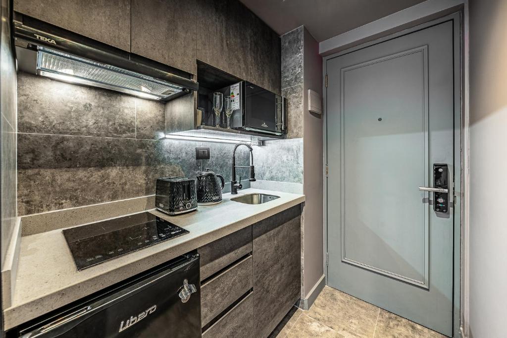 Kuchyň nebo kuchyňský kout v ubytování Design Tech Comfort & Location