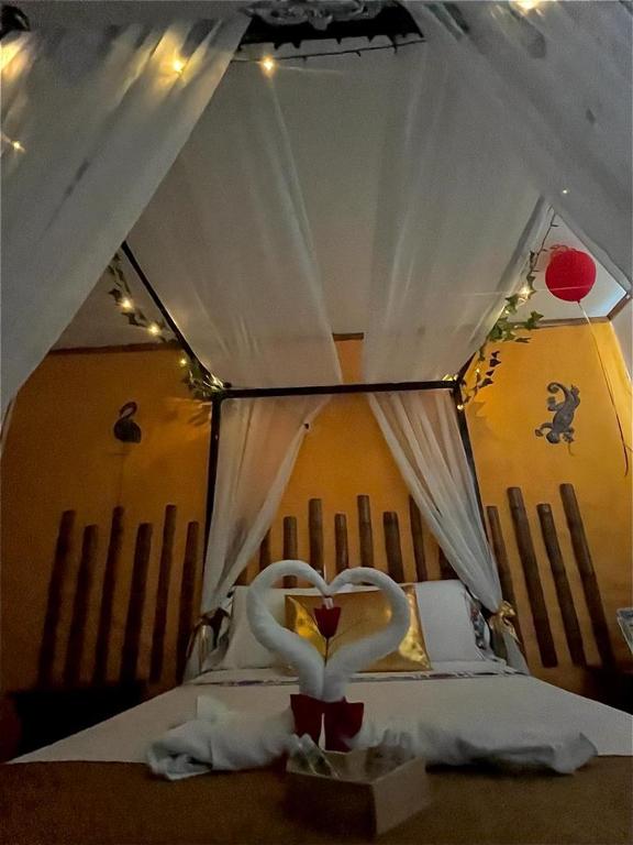 Postel nebo postele na pokoji v ubytování PH BOUTIQUE HOTEL Girardot