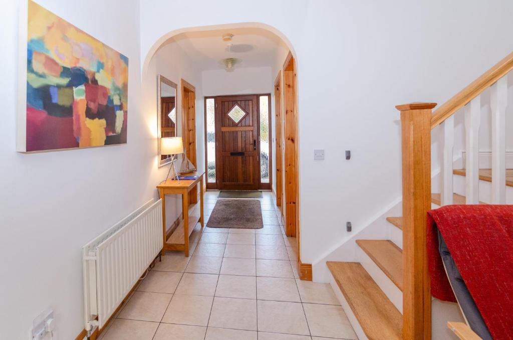 Postel nebo postele na pokoji v ubytování Rathmullan Village Home