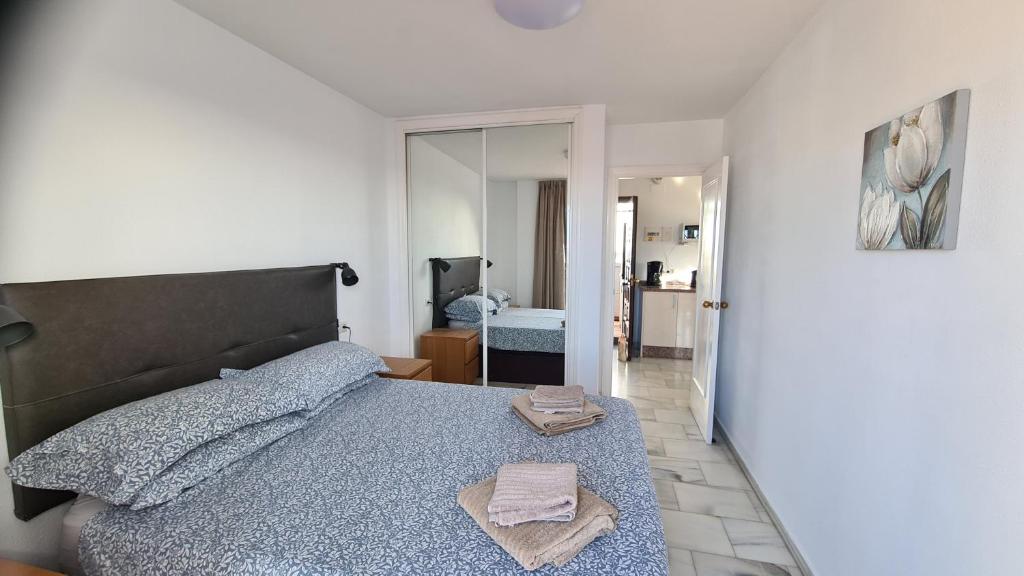 Posteľ alebo postele v izbe v ubytovaní Penthouse at Pueblo Evita