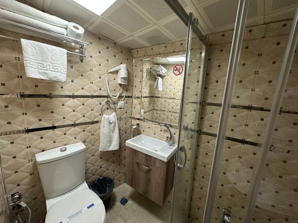 Koupelna v ubytování Line Suite Hotel
