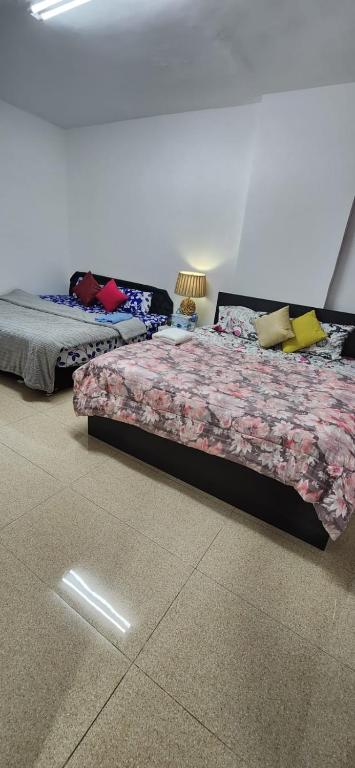 Postel nebo postele na pokoji v ubytování jason apartment