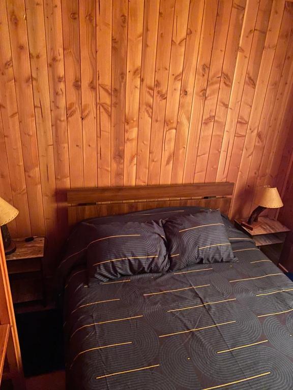 Postel nebo postele na pokoji v ubytování Portal Costanera Caburgua