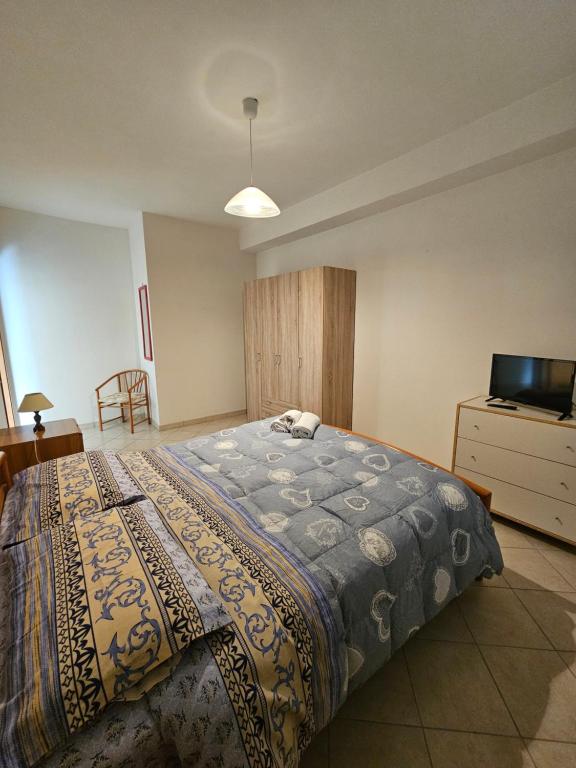 Postel nebo postele na pokoji v ubytování Le Casette di Prissy