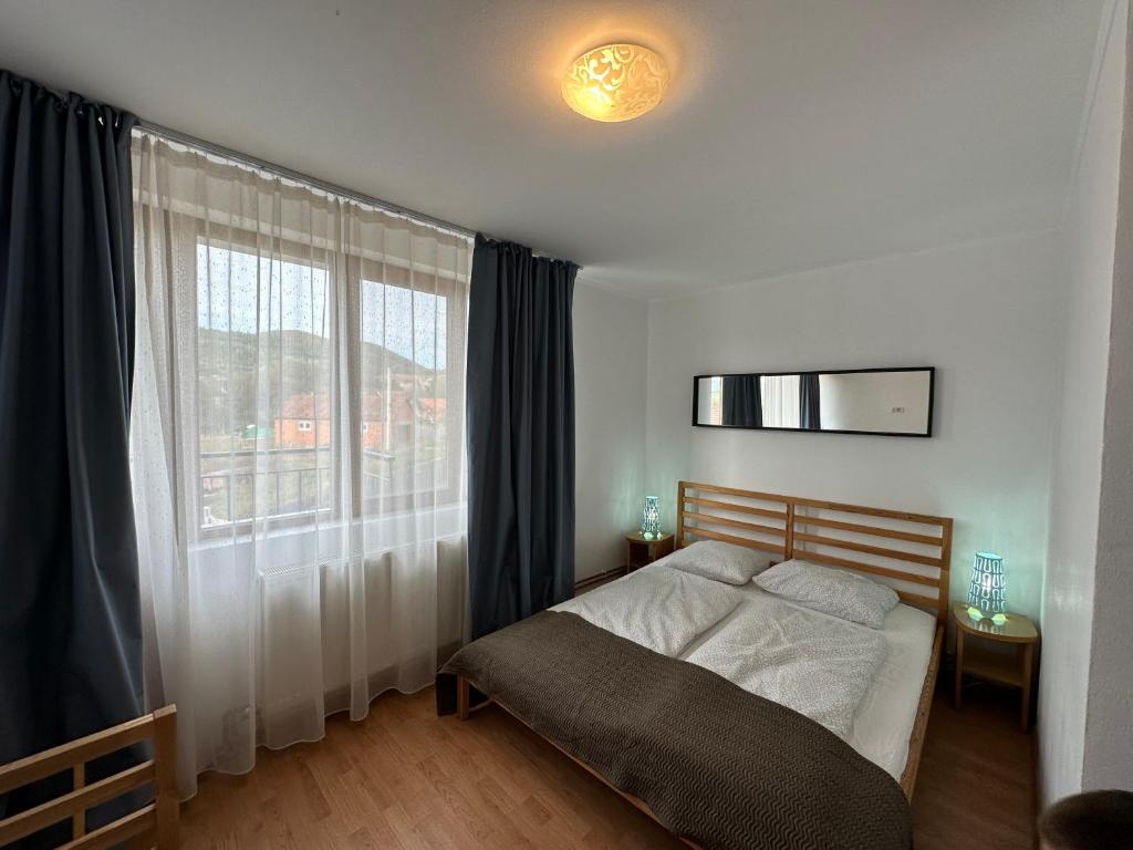 Postel nebo postele na pokoji v ubytování Cassa-Grande