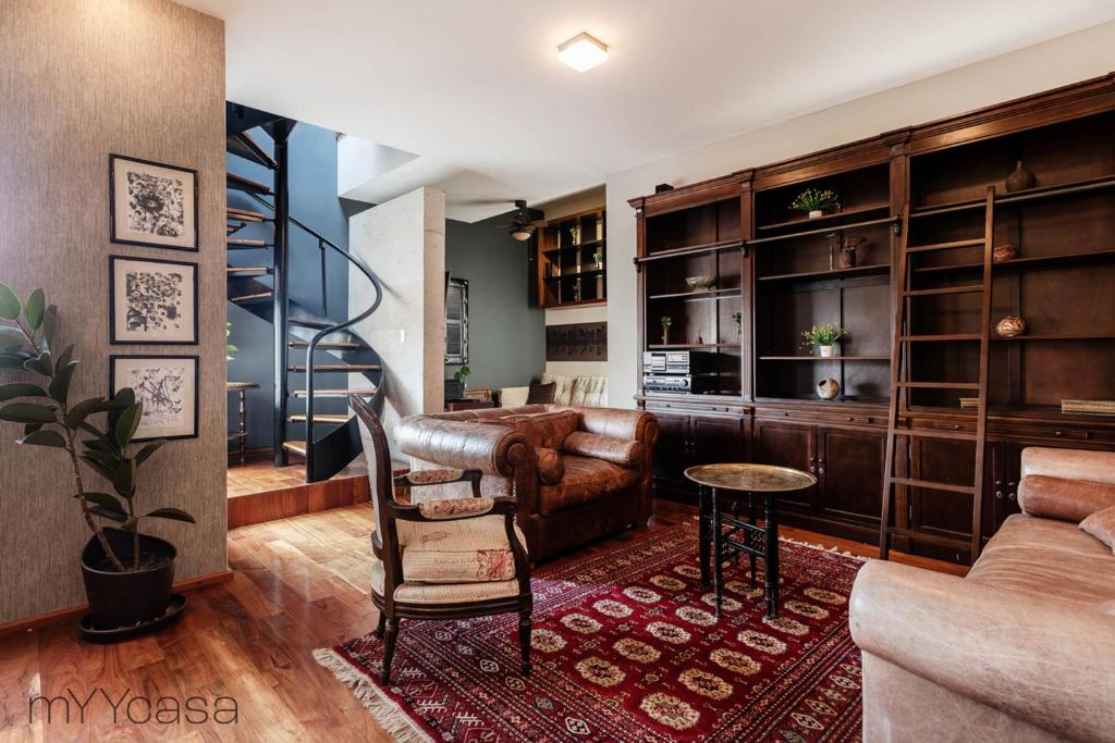 Ruang duduk di Destination Condesa @Roma Norte Penthouse Loft
