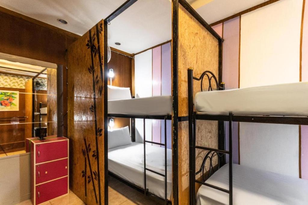 Postel nebo postele na pokoji v ubytování Riverside Guesthouse