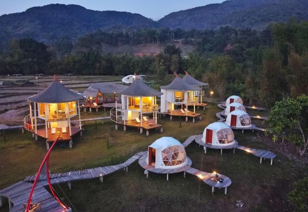 an aerial view of a group of domed tents at Vieng Sava in Ban Huai Ti