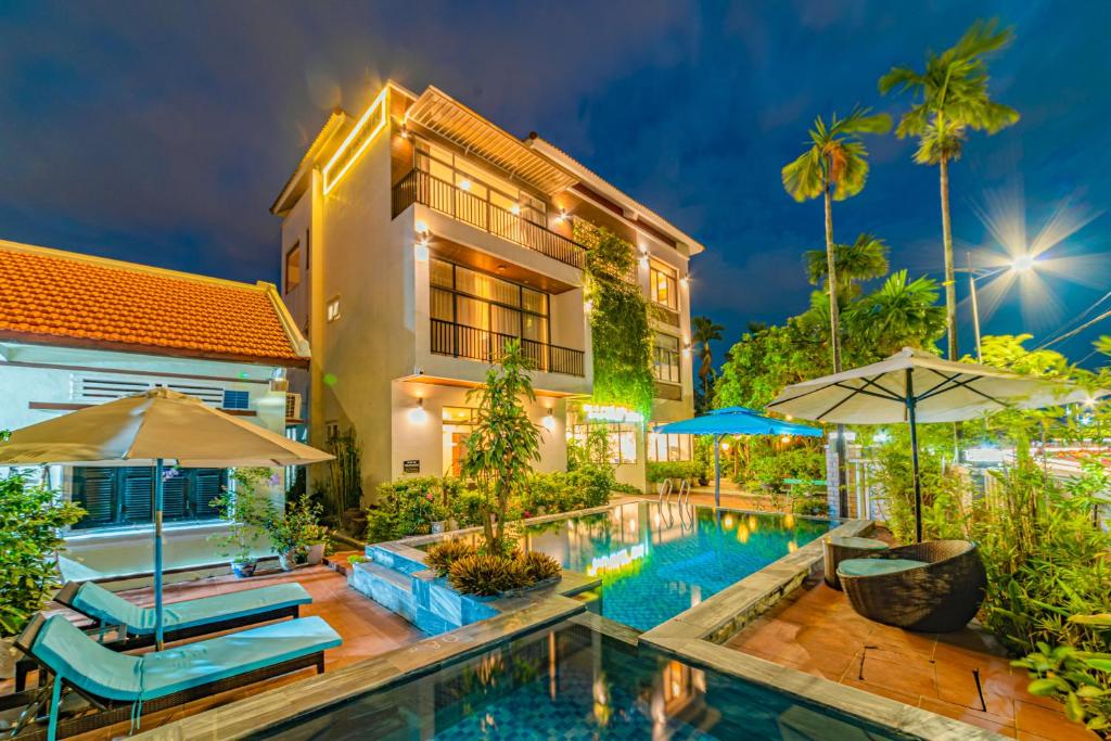 an image of a house with a swimming pool at HA Gateway Inn Hoian Priavate Pool Villa in Hoi An
