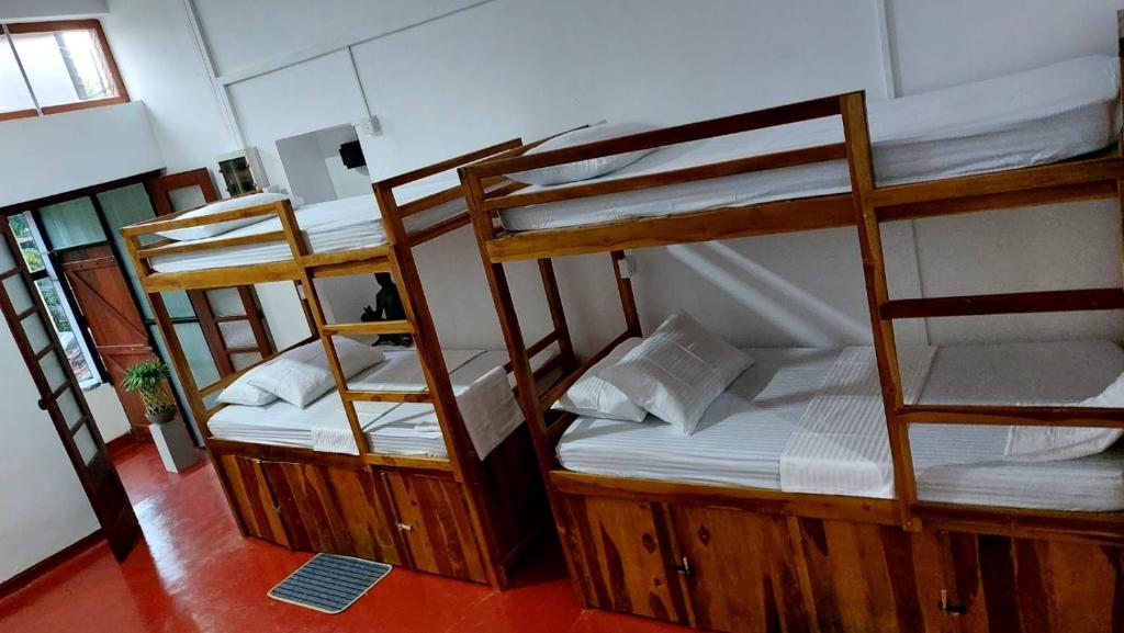 Postel nebo postele na pokoji v ubytování CEYLON STAYZ