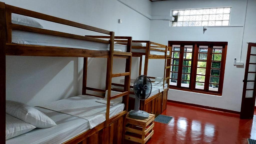 Postel nebo postele na pokoji v ubytování CEYLON STAYZ