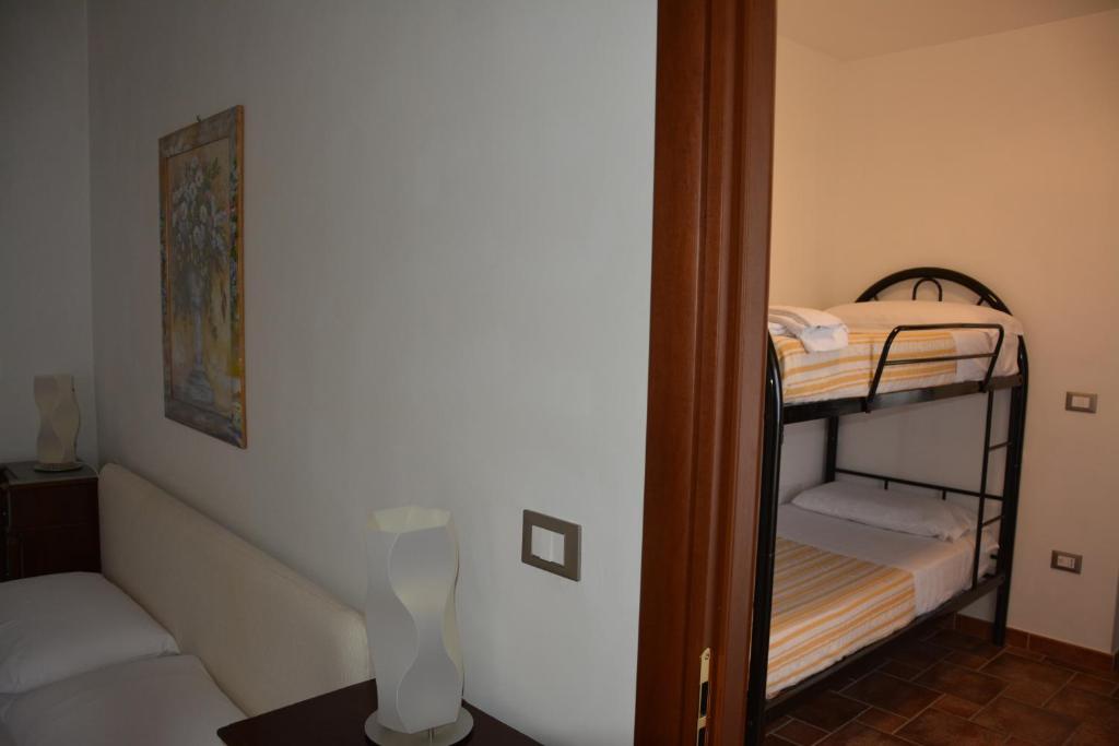 Postel nebo postele na pokoji v ubytování B&B La Casa Rossa