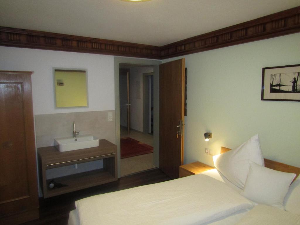 Postel nebo postele na pokoji v ubytování Haus Christopherus