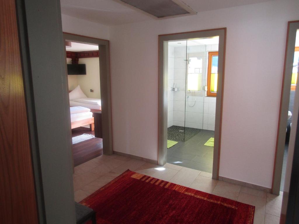 Postel nebo postele na pokoji v ubytování Haus Christopherus