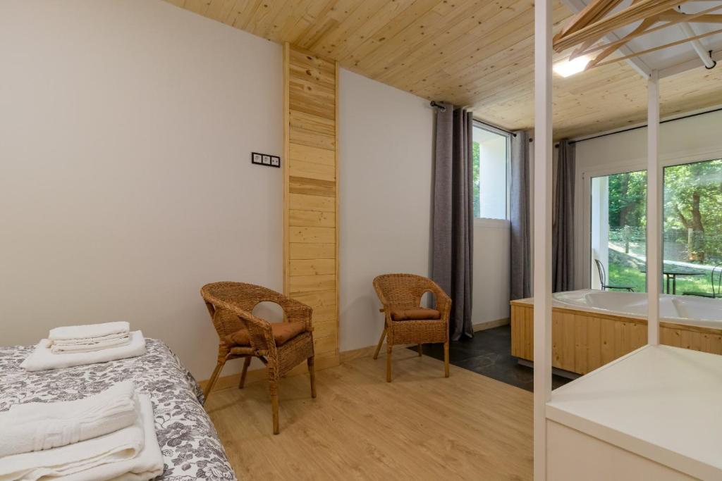Postel nebo postele na pokoji v ubytování Apartamentos El Bosque De Cubas