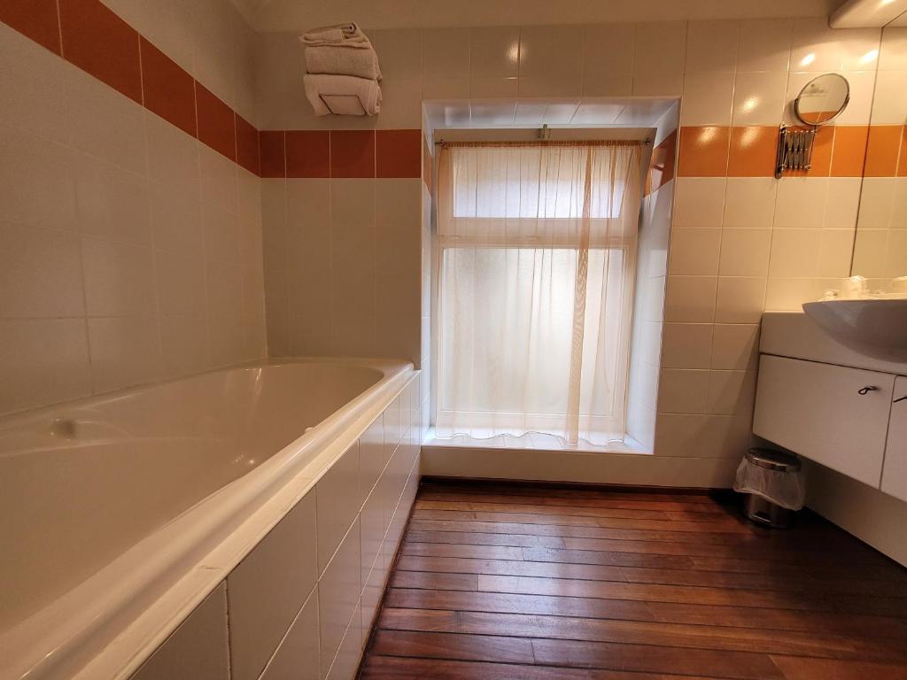 Koupelna v ubytování Hotel Fouillade