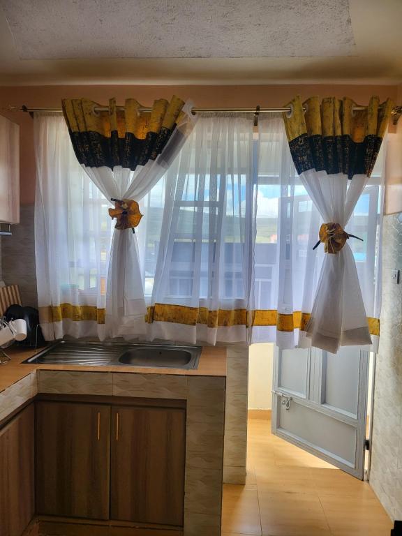Kuchyň nebo kuchyňský kout v ubytování G&G Executive Homes Pipeline Nakuru