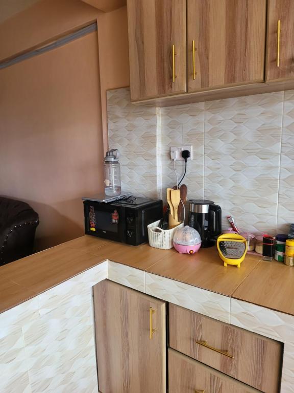 Kuchyň nebo kuchyňský kout v ubytování G&G Executive Homes Pipeline Nakuru