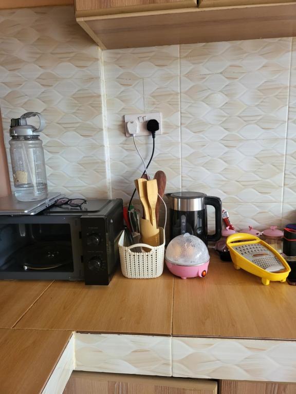 Kuchyň nebo kuchyňský kout v ubytování G&G Executive Homes Pipeline Nakuru