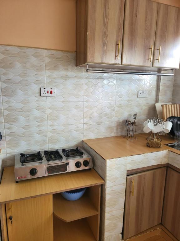 Kuchyň nebo kuchyňský kout v ubytování G&G Executive Homes Pipeline Nakuru