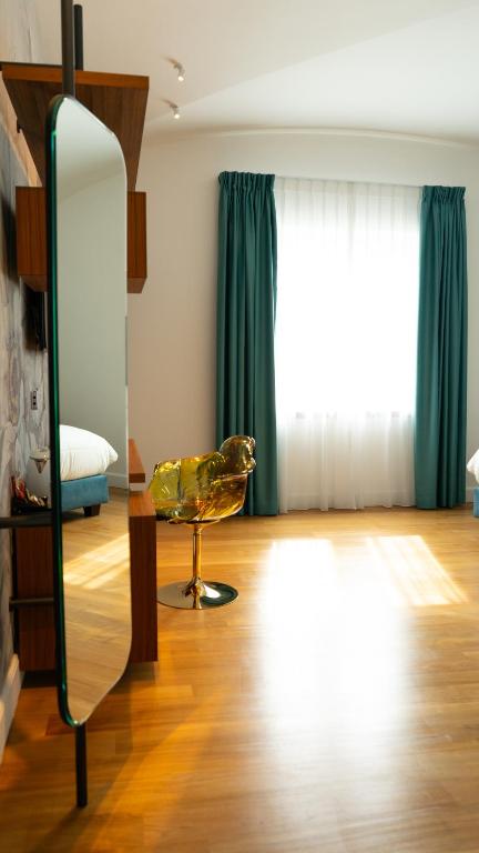 Postel nebo postele na pokoji v ubytování Palazzo Martinelli