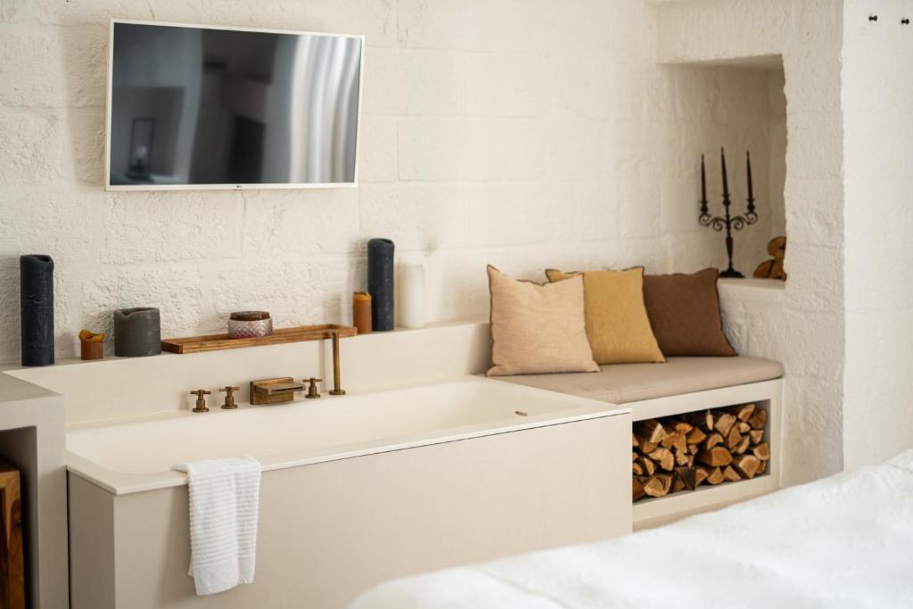Postel nebo postele na pokoji v ubytování AL PALAZZO La Dimora by Apulia Hospitality