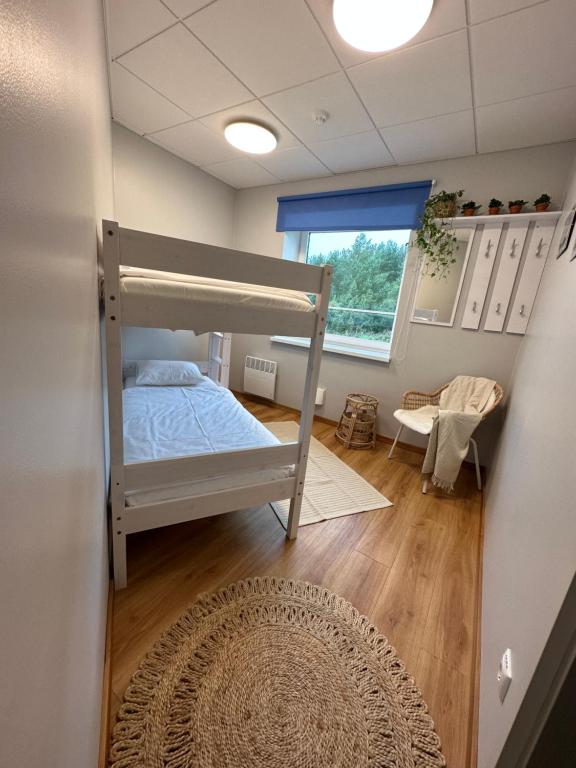 Postel nebo postele na pokoji v ubytování Österby sadamahoone